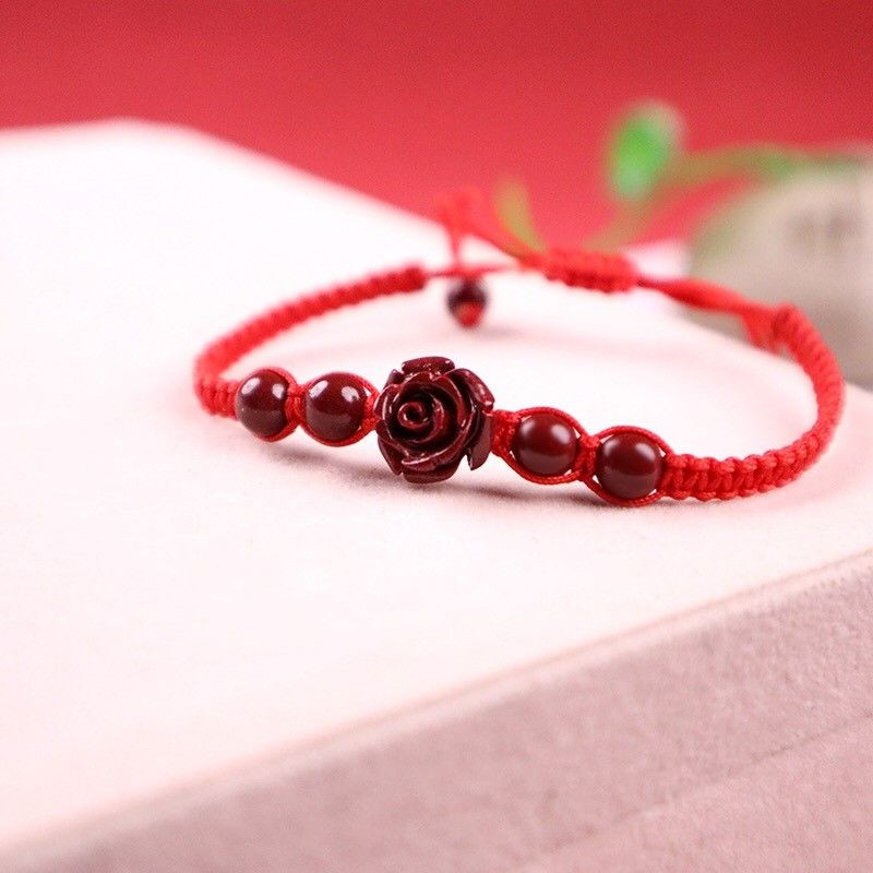 High-content purple gold cinnabar beckoning rose red rope bracelet.