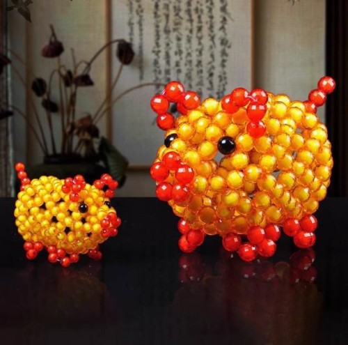 Hand-woven lucky pig ornaments